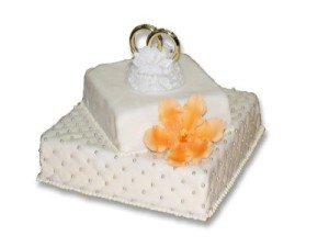Tort na wesele ze zdobieniami w kształcie obrączek